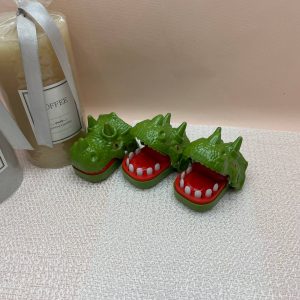 Žaidimas paspausk dantuką dinozaurui